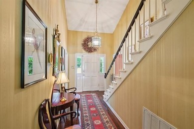 Lovely raised Acadian cottage on an oversized lot fronting the on Covington Country Club in Louisiana - for sale on GolfHomes.com, golf home, golf lot