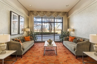 Stunning condo residing on the 13th floor, offering unparalleled on Evergreen Hills Golf Course in Michigan - for sale on GolfHomes.com, golf home, golf lot