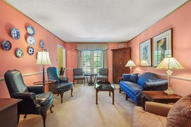 Lovely raised Acadian cottage on an oversized lot fronting the on Covington Country Club in Louisiana - for sale on GolfHomes.com, golf home, golf lot