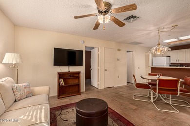 Experience delightful adult living in this 2-bedroom unit on Sun Village Golf Course in Arizona - for sale on GolfHomes.com, golf home, golf lot