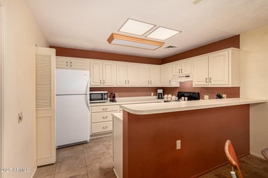 Experience delightful adult living in this 2-bedroom unit on Sun Village Golf Course in Arizona - for sale on GolfHomes.com, golf home, golf lot