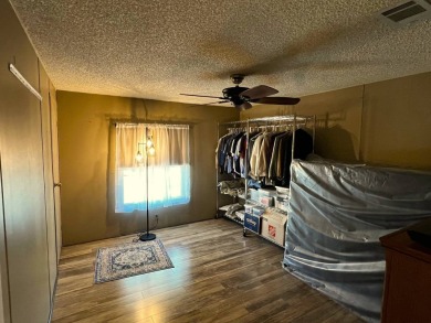 Discover the charm of this exceptional property, featuring:    - on Lake Henry Golf Club in Florida - for sale on GolfHomes.com, golf home, golf lot
