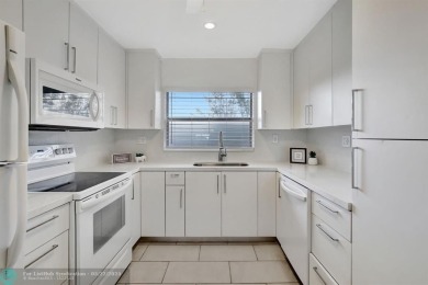 BEAUTIFUL, SPACIOUS 2 BEDROOM, 2 BATH ON THE TOP FLOOR WITH on Sunrise Lakes Phase III in Florida - for sale on GolfHomes.com, golf home, golf lot