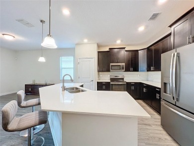 Check out this magnificent 4-bedroom 2-bath home in the much on ChampionsGate Golf Resort in Florida - for sale on GolfHomes.com, golf home, golf lot