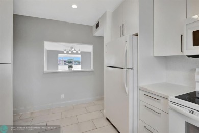 BEAUTIFUL, SPACIOUS 2 BEDROOM, 2 BATH ON THE TOP FLOOR WITH on Sunrise Lakes Phase III in Florida - for sale on GolfHomes.com, golf home, golf lot