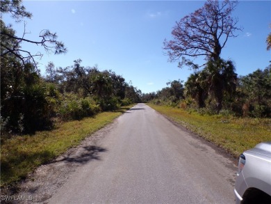 This lot is on a quiet street that would be a great place to on Sabal Trace Golf and Country Club in Florida - for sale on GolfHomes.com, golf home, golf lot
