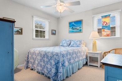 Welcome to this charming 4-bedroom, 3-bathroom fully furnished on Surf Golf and Beach Club in South Carolina - for sale on GolfHomes.com, golf home, golf lot