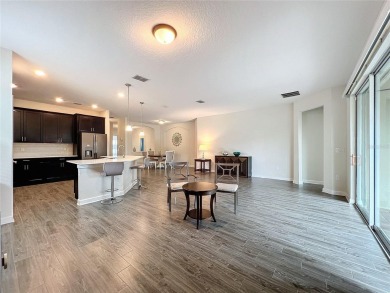 Check out this magnificent 4-bedroom 2-bath home in the much on ChampionsGate Golf Resort in Florida - for sale on GolfHomes.com, golf home, golf lot