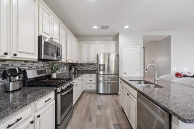 Exceptional Value in Verrado - Owned Solar with Energy Credits on Verrado Golf Club  in Arizona - for sale on GolfHomes.com, golf home, golf lot
