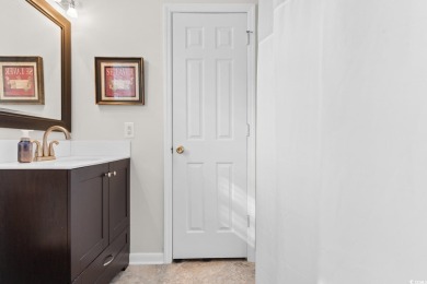 Welcome to this charming 4-bedroom, 3-bathroom fully furnished on Surf Golf and Beach Club in South Carolina - for sale on GolfHomes.com, golf home, golf lot