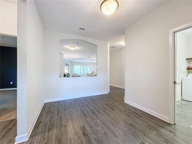Check out this magnificent 4-bedroom 2-bath home in the much on ChampionsGate Golf Resort in Florida - for sale on GolfHomes.com, golf home, golf lot