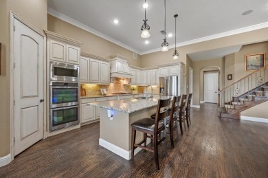 Situated on a .3-acre lot overlooking Hole #4 of the Whitworth on Trophy Club of Dallas in Texas - for sale on GolfHomes.com, golf home, golf lot