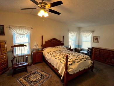 Discover the charm of this exceptional property, featuring:    - on Lake Henry Golf Club in Florida - for sale on GolfHomes.com, golf home, golf lot