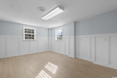 Welcome to this charming 4-bedroom, 3-bathroom fully furnished on Surf Golf and Beach Club in South Carolina - for sale on GolfHomes.com, golf home, golf lot