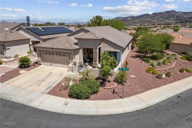 Located in Sun City MacDonald Ranch, this popular single-story on Desert Willow Golf Course in Nevada - for sale on GolfHomes.com, golf home, golf lot
