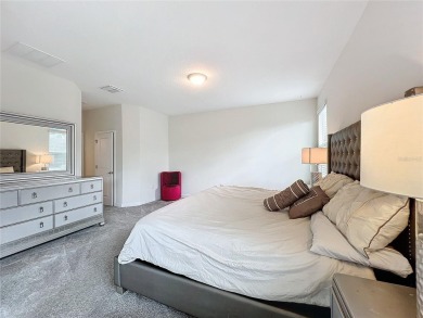 Check out this magnificent 4-bedroom 2-bath home in the much on ChampionsGate Golf Resort in Florida - for sale on GolfHomes.com, golf home, golf lot