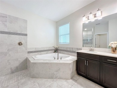 Check out this magnificent 4-bedroom 2-bath home in the much on ChampionsGate Golf Resort in Florida - for sale on GolfHomes.com, golf home, golf lot