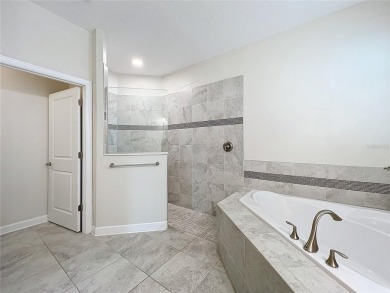 Check out this magnificent 4-bedroom 2-bath home in the much on ChampionsGate Golf Resort in Florida - for sale on GolfHomes.com, golf home, golf lot