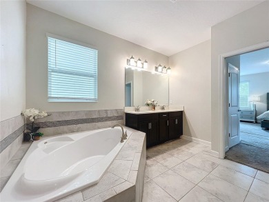 Check out this magnificent 4-bedroom 2-bath home in the much on ChampionsGate Golf Resort in Florida - for sale on GolfHomes.com, golf home, golf lot