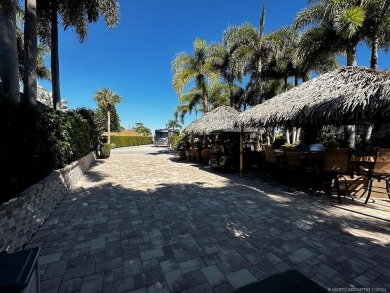 Experience the pinnacle of lakefront RV living with this on St. Lucie Trail Golf Club in Florida - for sale on GolfHomes.com, golf home, golf lot