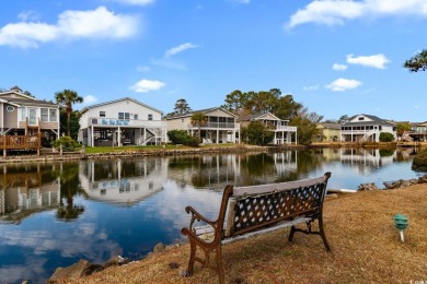 Welcome to this charming 4-bedroom, 3-bathroom fully furnished on Surf Golf and Beach Club in South Carolina - for sale on GolfHomes.com, golf home, golf lot
