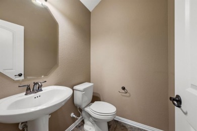 Situated on a .3-acre lot overlooking Hole #4 of the Whitworth on Trophy Club of Dallas in Texas - for sale on GolfHomes.com, golf home, golf lot