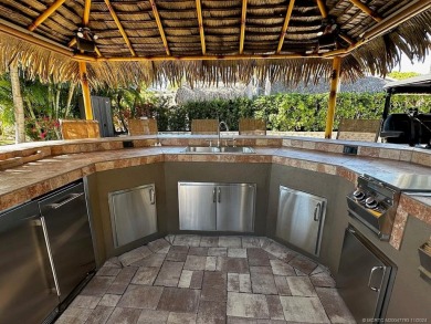 Experience the pinnacle of lakefront RV living with this on St. Lucie Trail Golf Club in Florida - for sale on GolfHomes.com, golf home, golf lot