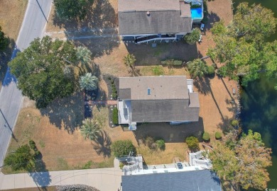 Welcome to this charming 4-bedroom, 3-bathroom fully furnished on Surf Golf and Beach Club in South Carolina - for sale on GolfHomes.com, golf home, golf lot