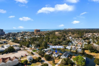 Welcome to this charming 4-bedroom, 3-bathroom fully furnished on Surf Golf and Beach Club in South Carolina - for sale on GolfHomes.com, golf home, golf lot