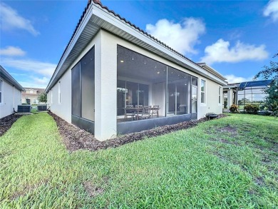 Check out this magnificent 4-bedroom 2-bath home in the much on ChampionsGate Golf Resort in Florida - for sale on GolfHomes.com, golf home, golf lot