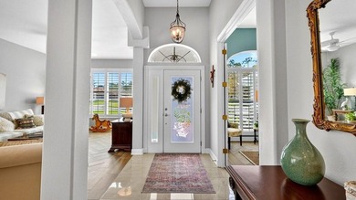 Perfectly positioned on the 12th tee of the south golf course in on Plantation Bay Golf and Country Club in Florida - for sale on GolfHomes.com, golf home, golf lot