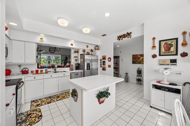 Wake up to sunrises over Palm Beach National's championship on Palm Beach National Golf and Country Club in Florida - for sale on GolfHomes.com, golf home, golf lot