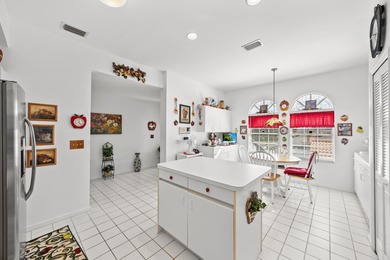 Wake up to sunrises over Palm Beach National's championship on Palm Beach National Golf and Country Club in Florida - for sale on GolfHomes.com, golf home, golf lot