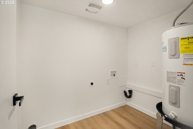 Don't miss this stunning 4-bedroom, 3-bathroom home where modern on Lake Oswego Municipal Golf Course in Oregon - for sale on GolfHomes.com, golf home, golf lot