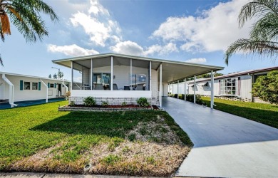 Located in the highly desirable STONEHEDGE ON THE HILL 55+ on Tarpon Springs Golf Course in Florida - for sale on GolfHomes.com, golf home, golf lot