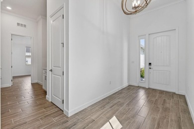 Nestled within a prestigious gated golf community, this on The Tesoro Golf Course and Club in Florida - for sale on GolfHomes.com, golf home, golf lot