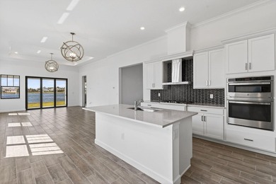 Nestled within a prestigious gated golf community, this on The Tesoro Golf Course and Club in Florida - for sale on GolfHomes.com, golf home, golf lot