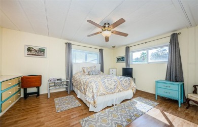 Located in the highly desirable STONEHEDGE ON THE HILL 55+ on Tarpon Springs Golf Course in Florida - for sale on GolfHomes.com, golf home, golf lot
