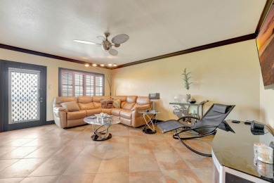 High end remodel, fully furnished, move in ready. expanded open on Hillsboro Pines Golf in Florida - for sale on GolfHomes.com, golf home, golf lot