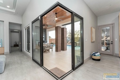 Stunning modern home built in 2022, located in the SPI golf on South Padre Island Golf Club in Texas - for sale on GolfHomes.com, golf home, golf lot