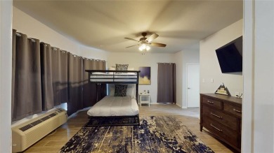 Welcome home to Tanglewood Golf Resort! It's on the 1st floor on Tanglewood Resort in Texas - for sale on GolfHomes.com, golf home, golf lot