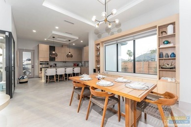 Stunning modern home built in 2022, located in the SPI golf on South Padre Island Golf Club in Texas - for sale on GolfHomes.com, golf home, golf lot