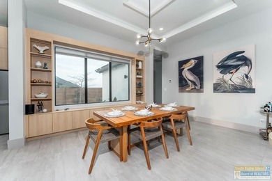 Stunning modern home built in 2022, located in the SPI golf on South Padre Island Golf Club in Texas - for sale on GolfHomes.com, golf home, golf lot