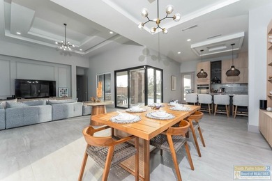 Stunning modern home built in 2022, located in the SPI golf on South Padre Island Golf Club in Texas - for sale on GolfHomes.com, golf home, golf lot