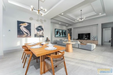 Stunning modern home built in 2022, located in the SPI golf on South Padre Island Golf Club in Texas - for sale on GolfHomes.com, golf home, golf lot