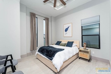 Stunning modern home built in 2022, located in the SPI golf on South Padre Island Golf Club in Texas - for sale on GolfHomes.com, golf home, golf lot