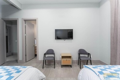 Stunning modern home built in 2022, located in the SPI golf on South Padre Island Golf Club in Texas - for sale on GolfHomes.com, golf home, golf lot