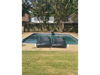 RIVER OAKS CHARMER with a beautiful in-ground pool area! Located on The Course at River Oaks in Arkansas - for sale on GolfHomes.com, golf home, golf lot
