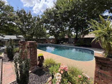 RIVER OAKS CHARMER with a beautiful in-ground pool area! Located on The Course at River Oaks in Arkansas - for sale on GolfHomes.com, golf home, golf lot
