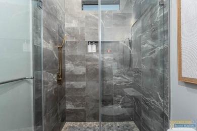 Stunning modern home built in 2022, located in the SPI golf on South Padre Island Golf Club in Texas - for sale on GolfHomes.com, golf home, golf lot